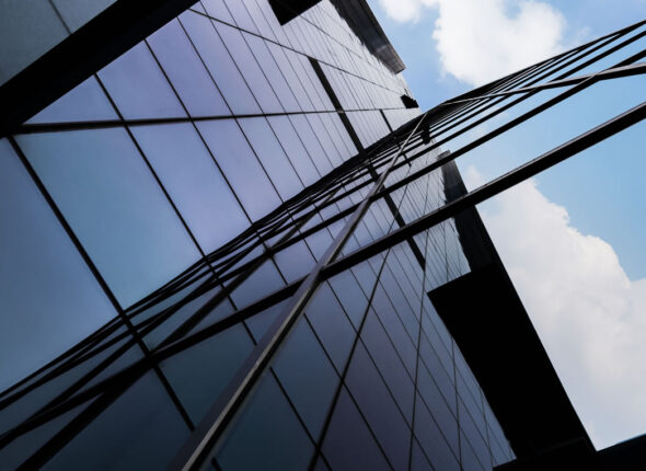 grayscale-shot-hallway-with-pillars-scaled-e1747213804170