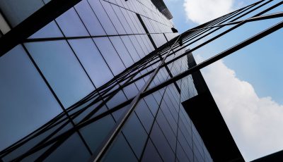 grayscale-shot-hallway-with-pillars-scaled-e1747213804170